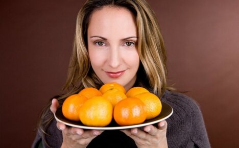 Pequeno, mas remoto - como as tangerinas são úteis para as mulheres