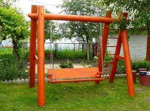 wooden swing in the country