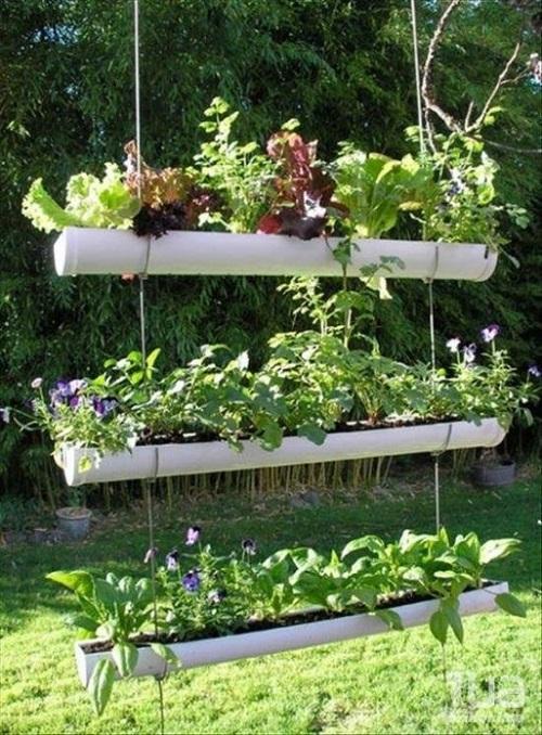hanging flower beds from pipes