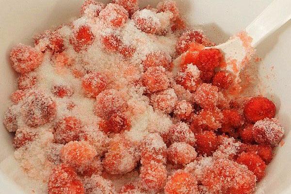 mix strawberries with sugar
