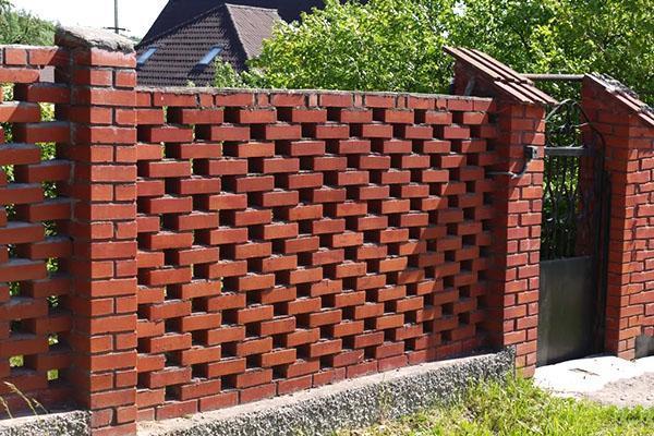 brick fence at their summer cottage